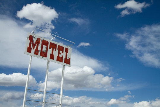 Retro Motel Sign and Clouds