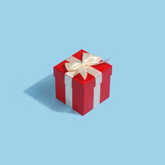 Red box for gifts on a blue background. Creative minimalistic concept. Valentine's Day