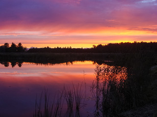 colorful sunset on the water, evening dusk