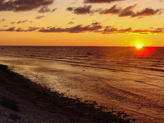 gorgeous sunset landscape background, pebble beach