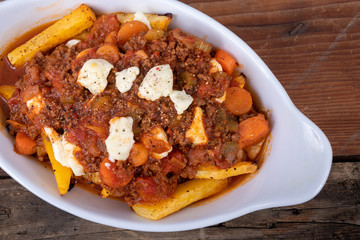Italian poutine with baked parsnip fries