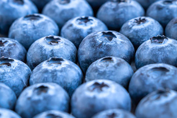 Close up view of the fresh blueberries on the table. 