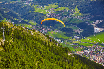 Paragliding in the mountains, in the Stubai Valley, Tyrol, Austria.