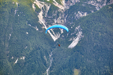 Paragliding in the mountains, in the Stubai Valley, Tyrol, Austria.