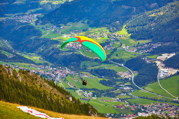 Paragliding in the mountains, in the Stubai Valley, Tyrol, Austria.