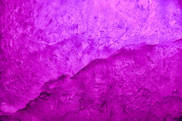 Abstract purple texture, floe surface illuminated by pink light.,