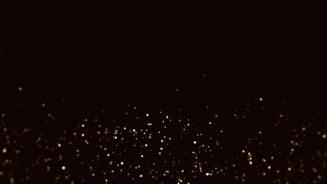 Slow motion of small particles in the form of gold dust on a black background HD