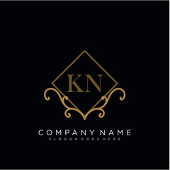 Initial letter KN logo luxury vector mark, gold color elegant classical