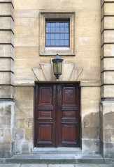 Old wooden door and window in chirch. Medieval europe architecture