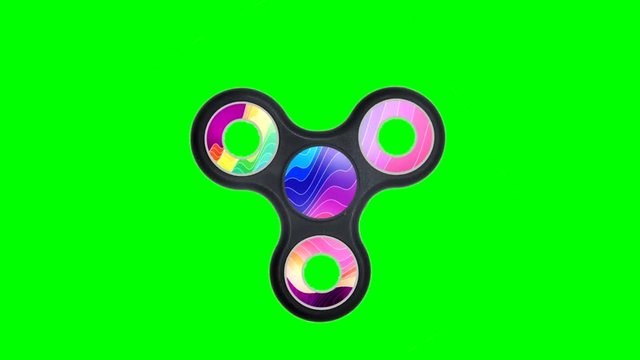 Rotating fidget spinner with green screen background