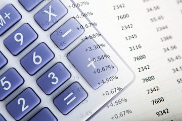 calculator with blue buttons and digits