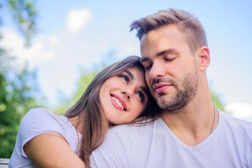 Obraz premium Playful couple. happy valentines day. summer vibes. family weekend. romantic date. couple in love. Skin and hair care. couple relax outdoor. Tender feeling. girl with guy in park. Beauty and fashion