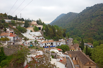 Sacromonte village famous for its houses made in caves at the hill slopes, Granada, Spain