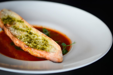 delicious tomatoes soup with toasted home made bread