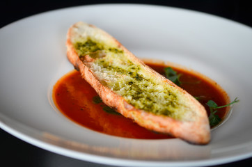 delicious tomatoes soup with toasted home made bread