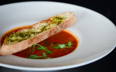 delicious tomatoes soup with toasted home made bread