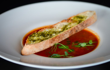 delicious tomatoes soup with toasted home made bread