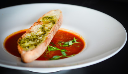 delicious tomatoes soup with toasted home made bread