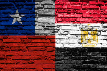Flag of Chile and Egypt on brick wall