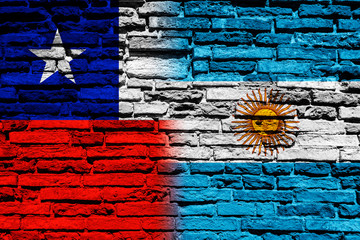 Flag of Chile and Argentina on brick wall