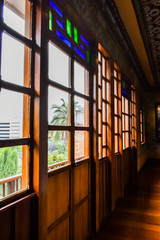 Doors with square windows and green and blue colored glass