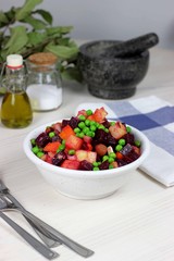  vegan beetroot salad with fresh green peas and pickles