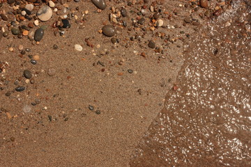 Sand und Wasser am Strand Detail 