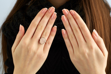 Woman hands with ring and manicure
