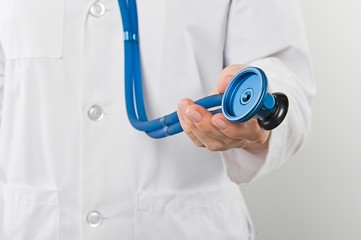 Female Nurse Holding Stethoscope