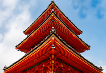 Partial view of the red main gate in the buddhist temple Kiyomizu-dera in Kyoto, Japan