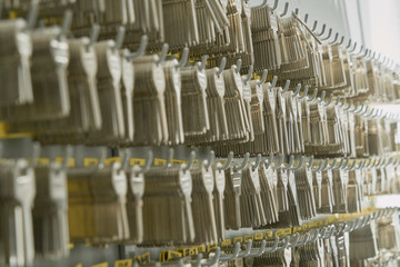 duplicates of keys of house and doors in the wall of a locksmith's shop to be able to make the copies