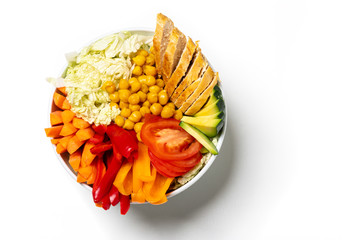 buddha bowl with chicken on wood