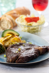 grilled steak with potato gratin