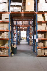 Boxes On Shelves In Warehouse