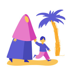 Muslim woman is walking with her son holding hands