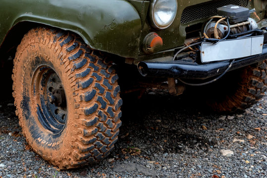 Close up image of off-road tire on ground