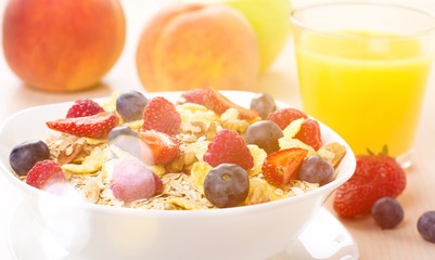 Delicious oat flakes with berries, close-up