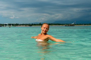 Woman at tropical island beach