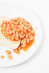 Baked beans and bread in plate