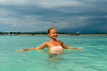 Woman at tropical island beach