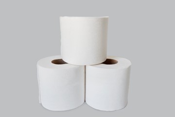 Close-up view of toilet paper stack on white background