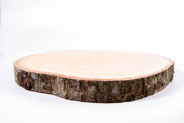 Slice of fresh oak wood on a white background	