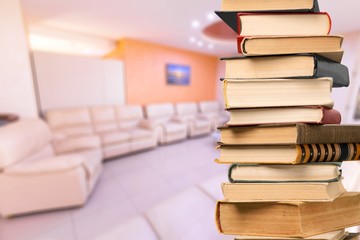 Books collection in pile on background.
