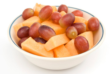 Fruit - Cantalope and Grapes Isolated on White