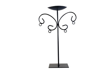 Metal carved black candlestick isolated on white background.