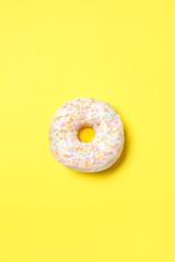 Sweet tasty donut on color background