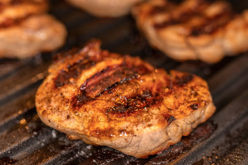 Grilled pork tenderloin medallions in the restaurant