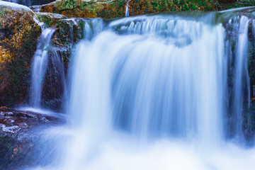 Wild Waterfall with Beautiful blur and soft flowing water by Night in Lower Silesia in Poland.