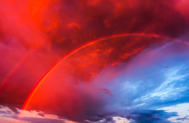 Fototapeta na wymiar Sunset sky and rainbow