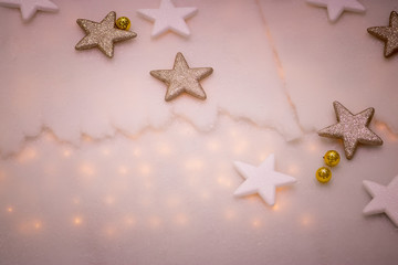 Fototapeta na wymiar light christmas background with snow and stars